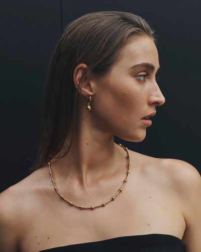 Temple of the Sun Alba Huggies Large, Gold